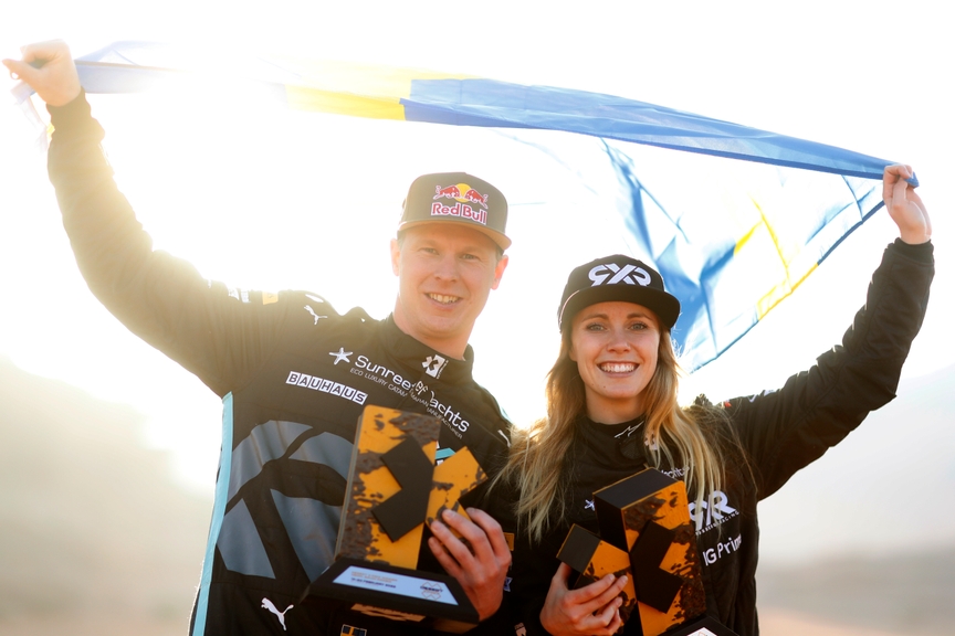 FEBRUARY 20: Johan Kristoffersson (SWE), Rosberg X Racing, and Mikaela Ahlin-Kottulinsky (SWE), Rosberg X Racing, 1st position, with their trophies and the Swedish flag during the Saudi Arabia on February 20, 2022. (Photo by Alastair Staley / LAT Images)