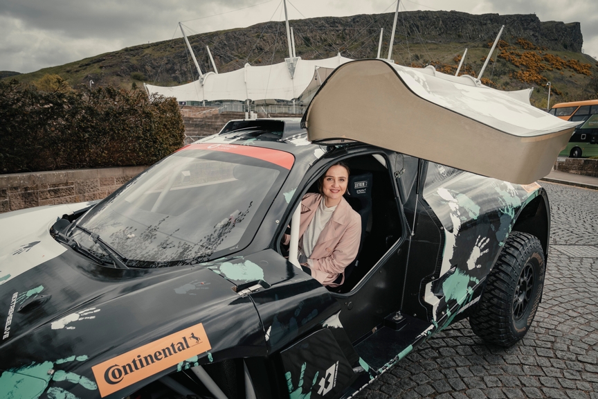 EXTREME E VISITS THE SCOTTISH PARLIAMENT
4 May 2023, Edinburgh:Â MÃ iri McAllan, the Cabinet Secretary for Net Zero and Just
Transition, was among those pictured beside one of the seriesâ?? ODYSSEY 21s from
the global electric off-road rally series Extreme E.
The net-zero championshipâ??s next race, the Hydro X Prix, will take place in the
former open-cast Glenmuckloch mine in Dumfries and Galloway on 13-14 May.
PIC: MÃ iri McAllan, the Cabinet Secretary for Net Zero and Just Transition, said:
â??Glenmuckloch is about to undergo the next phase of its major transformation into a
Pumped Storage Hydropower (PSH) plant and wind farm, so it will provide a
poignant backdrop for Extreme E, which uses its platform to raise awareness of
climate change and global solutions.
â??18 months ago world leaders met in Glasgow for COP26, aiming to secure global
net zero by the middle of this century. As an off-road rally series which focuses on
the promotion of electric vehicles and clean energy innovations, the former mine is
the perfect natural amphitheatre to showcase the necessary industry transition to
move from fossil fuels to clean energy futures, and the central role Scotland wants to
play in that just transition.â?
Alejandro Agag, Founder and CEO of Extreme E, said: â??We are thrilled to be
headed to Scotland for the Hydro X Prix, and we could not have found a more
perfect racing site than the former Glenmuckloch coal mine. Here in Scotland, our
race site will play homage to the much needed transition of an old coal mine which is
being given a new and exciting lease of life as a hydro-project which will provide a
fully renewable energy source for the region for centuries to come.â?
Extreme E has also revealed its plans to support the restoration of the River Nith to
ensure the preservation of Atlantic salmon numbers. Partnering with the Nith District
Salmon Fishery Board, the aim is to reverse the impact of climate change through
community engagement, education, and the ap