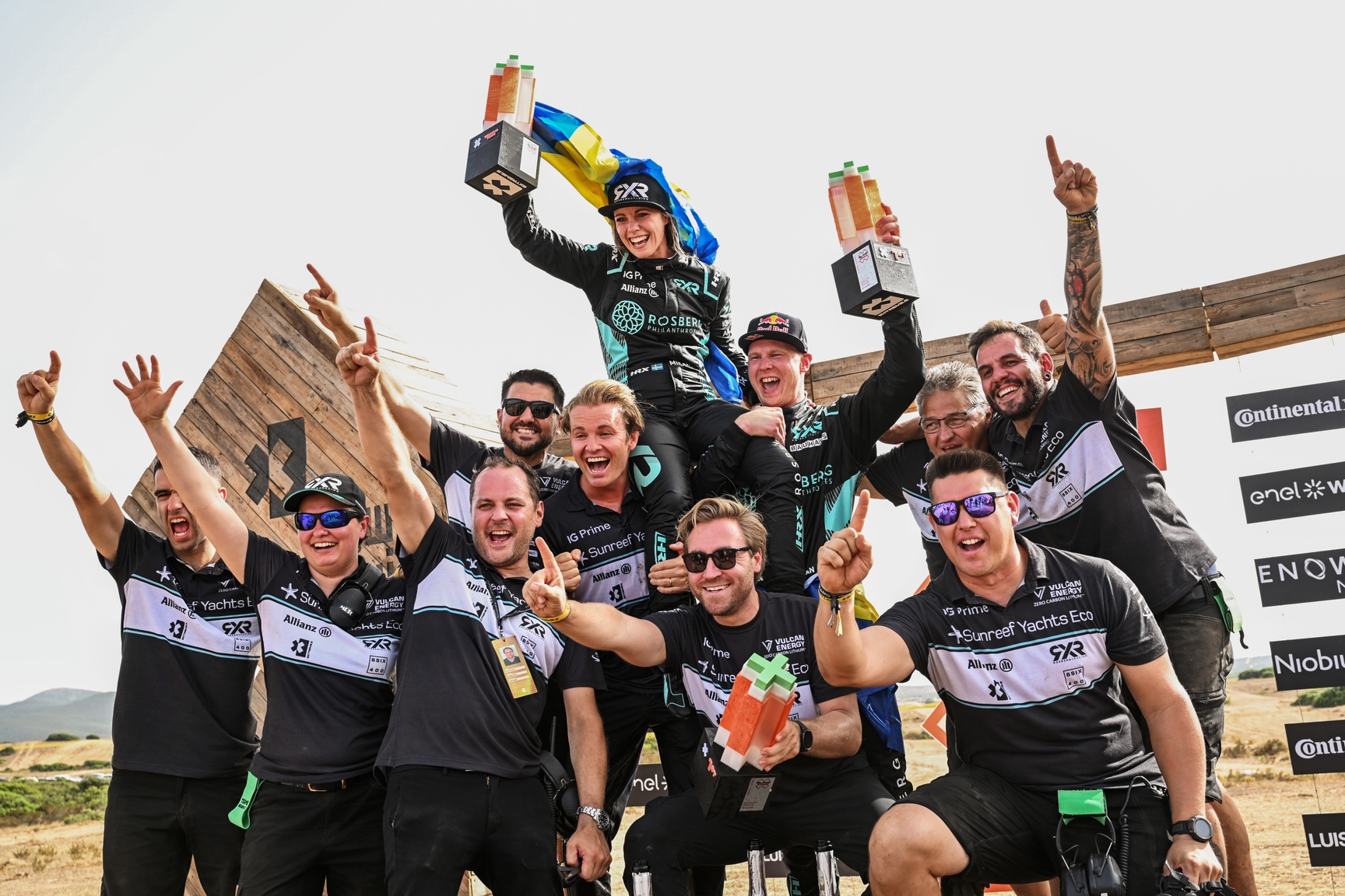 JULY 09: Mikaela Ahlin-Kottulinsky (SWE) / Johan Kristoffersson (SWE), Rosberg X Racing, 1st position, celebrate with Nico Rosberg, Owner, Rosberg X Racing, and the rest of the team on the podium during the Island X-Prix on July 09, 2023. (Photo by Sam Bagnall / LAT Images)