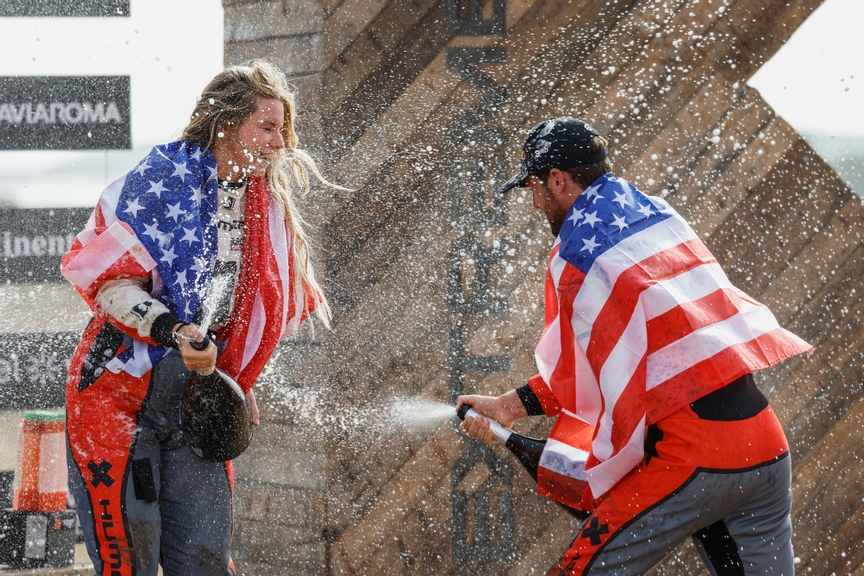 JULY 08: Amanda Sorensen (USA) / RJ Anderson (USA), GMC Hummer EV Chip Ganassi Racing, 3rd position, spray champagne on the podium during the Island X-Prix on July 08, 2023. (Photo by Sam Bloxham / LAT Images)