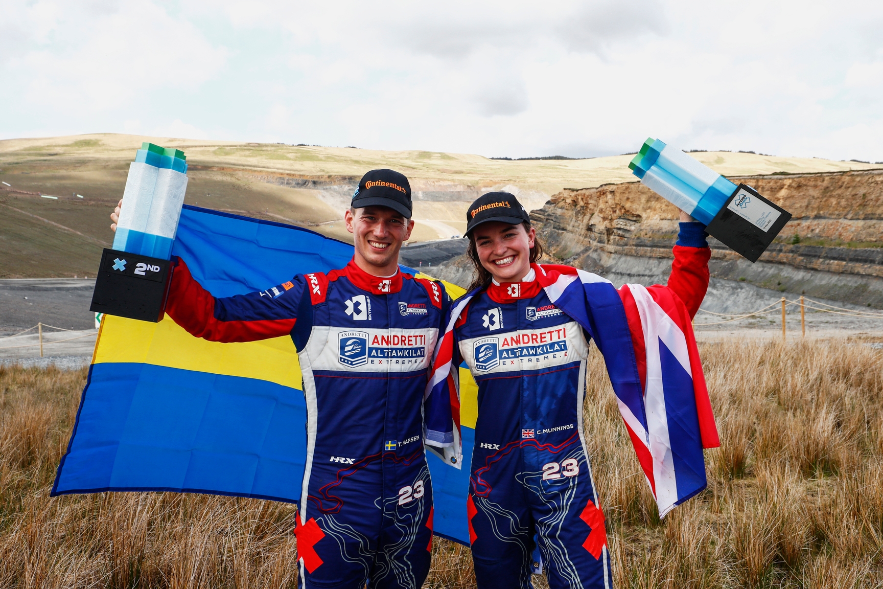 MAY 13: Timmy Hansen (SWE), Andretti Altawkilat Extreme E, and Catie Munnings (GBR), Andretti Altawkilat Extreme E, 2nd position, with their trophies during the Scotland X-Prix on May 13, 2023. (Photo by Sam Bloxham / LAT Images)