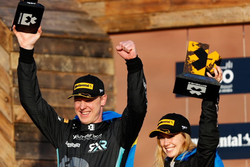 FEBRUARY 20: Johan Kristoffersson (SWE), Rosberg X Racing, and Mikaela Ahlin-Kottulinsky (SWE), Rosberg X Racing, 1st position, on the podium during the Saudi Arabia on February 20, 2022. (Photo by Alastair Staley / LAT Images)