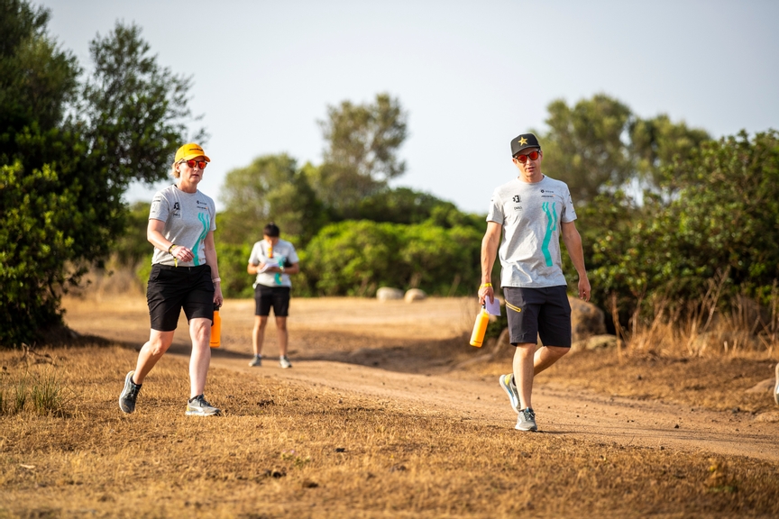 JULY 05: Emma Gilmour (NZL), NEOM McLaren Extreme E, and Tanner Foust (USA), NEOM McLaren Extreme E, walk the course during the Sardinia on July 05, 2022. (Photo by Sam Bloxham / LAT Images)