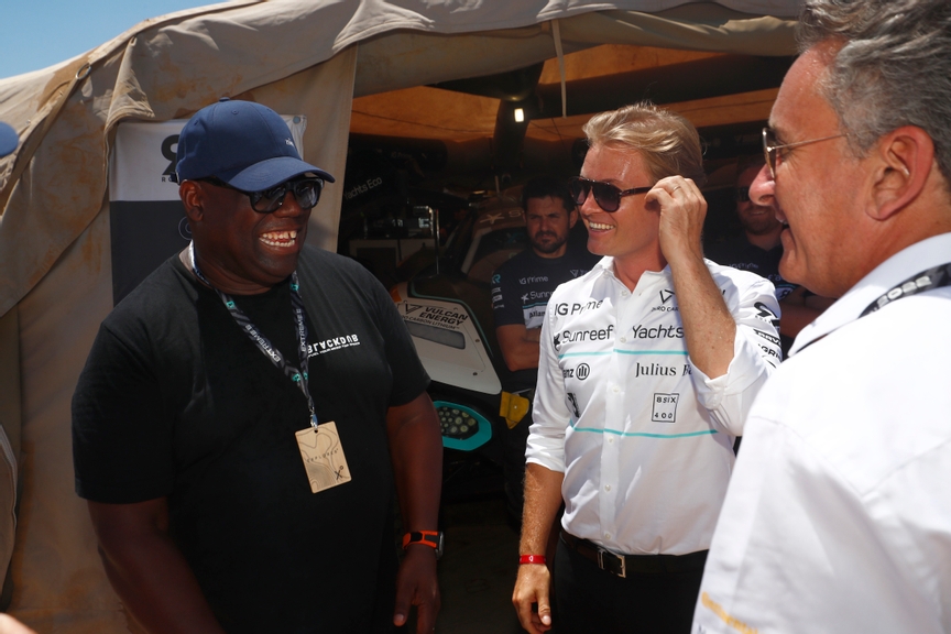 CAPO TEULADA, SARDINIA, ITALY - JULY 10: DJ Carl Cox having a tour of the garages  Nico Rosberg, Rosberg X Racing Team Founder & CEO Alejandro Agag, CEO, Extreme E during the Sardinia II on July 10, 2022 in Capo Teulada, Sardinia, Italy. (Photo by Sam Bloxham / LAT Images)